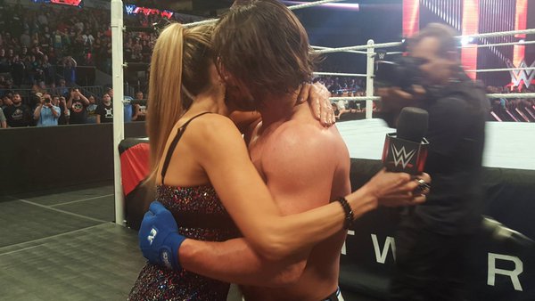 AJ Styles and Lilian Garcia hug