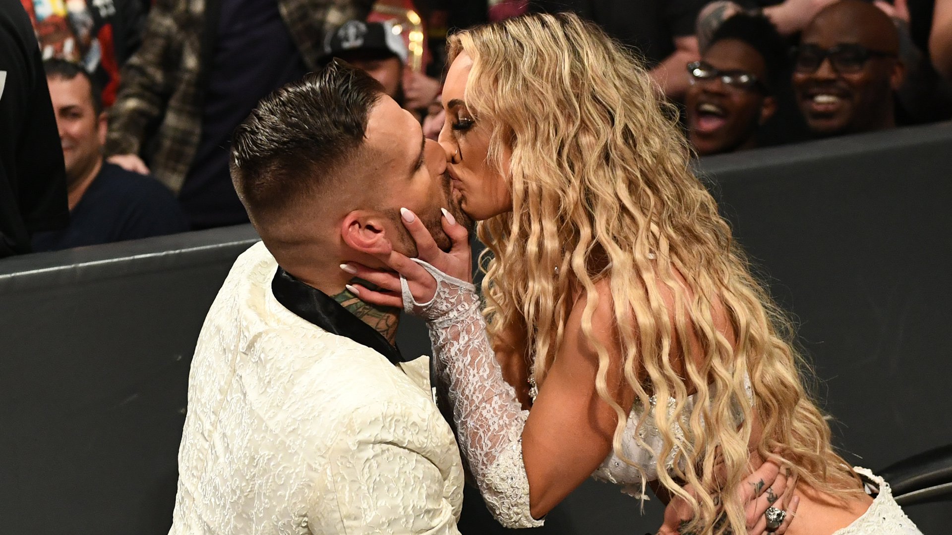 Carmella kisses Corey Graves