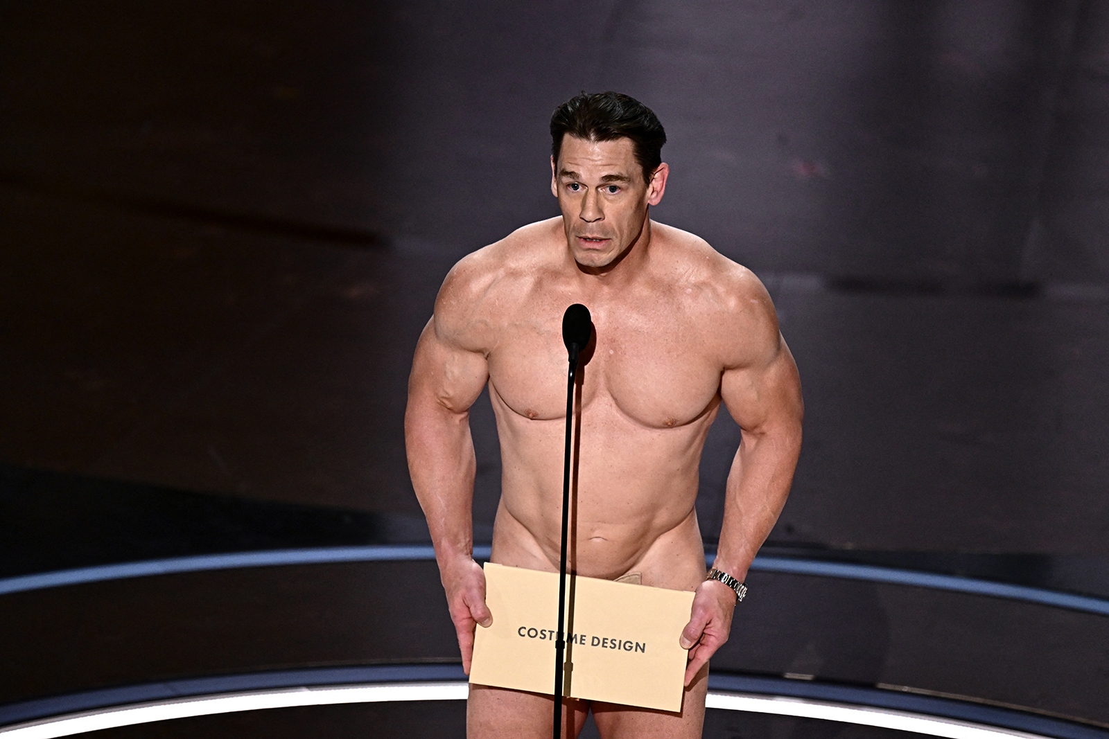 John Cena appears nervous while presenting the award for Best Costume Design at the 96th Academy Awards at the Dolby Theatre in Hollywood, California on March 10, 2024.