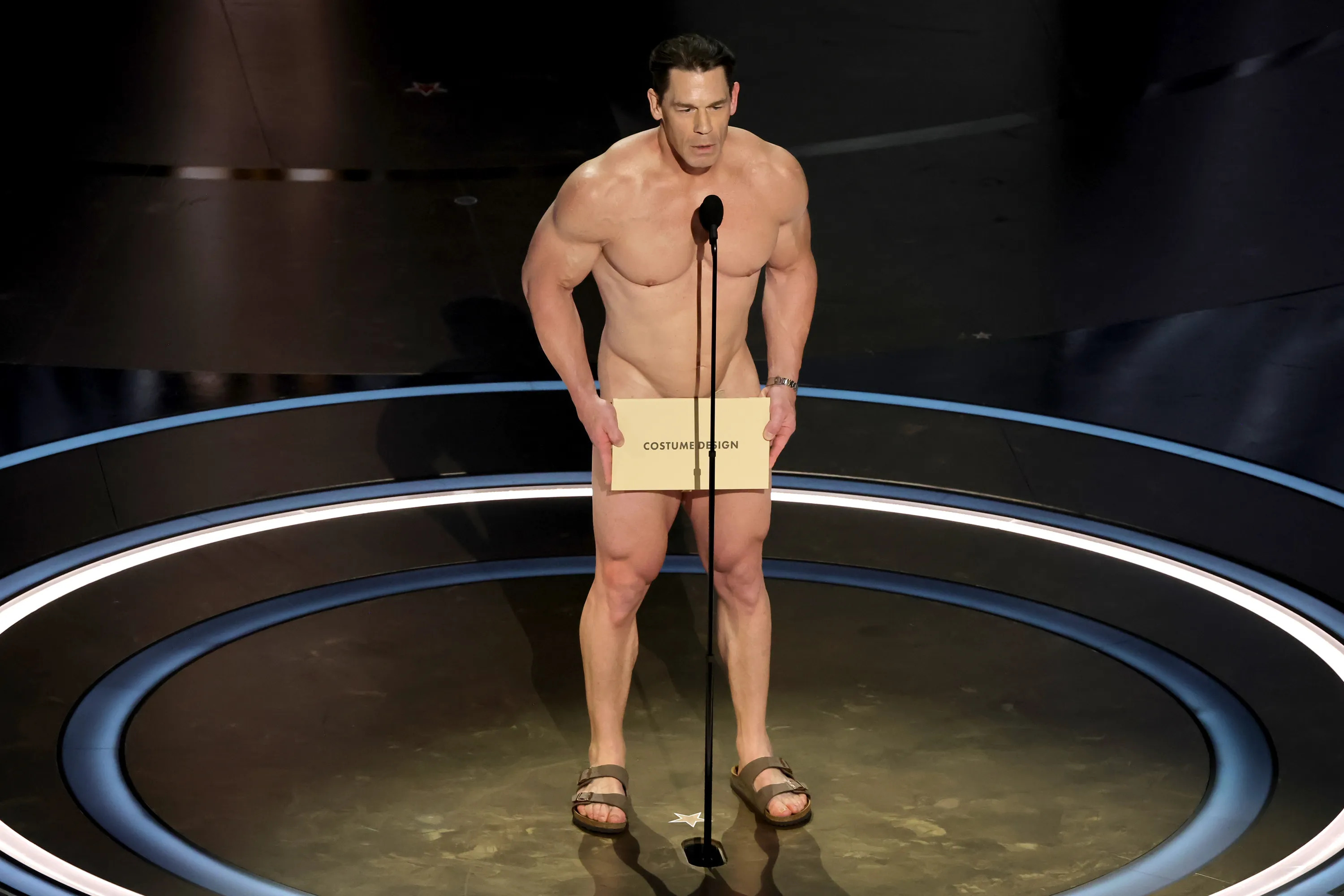 John Cena appears onstage to present the award for Best Costume Design at the 96th Academy Awards at the Dolby Theatre in Hollywood, California on March 10, 2024.