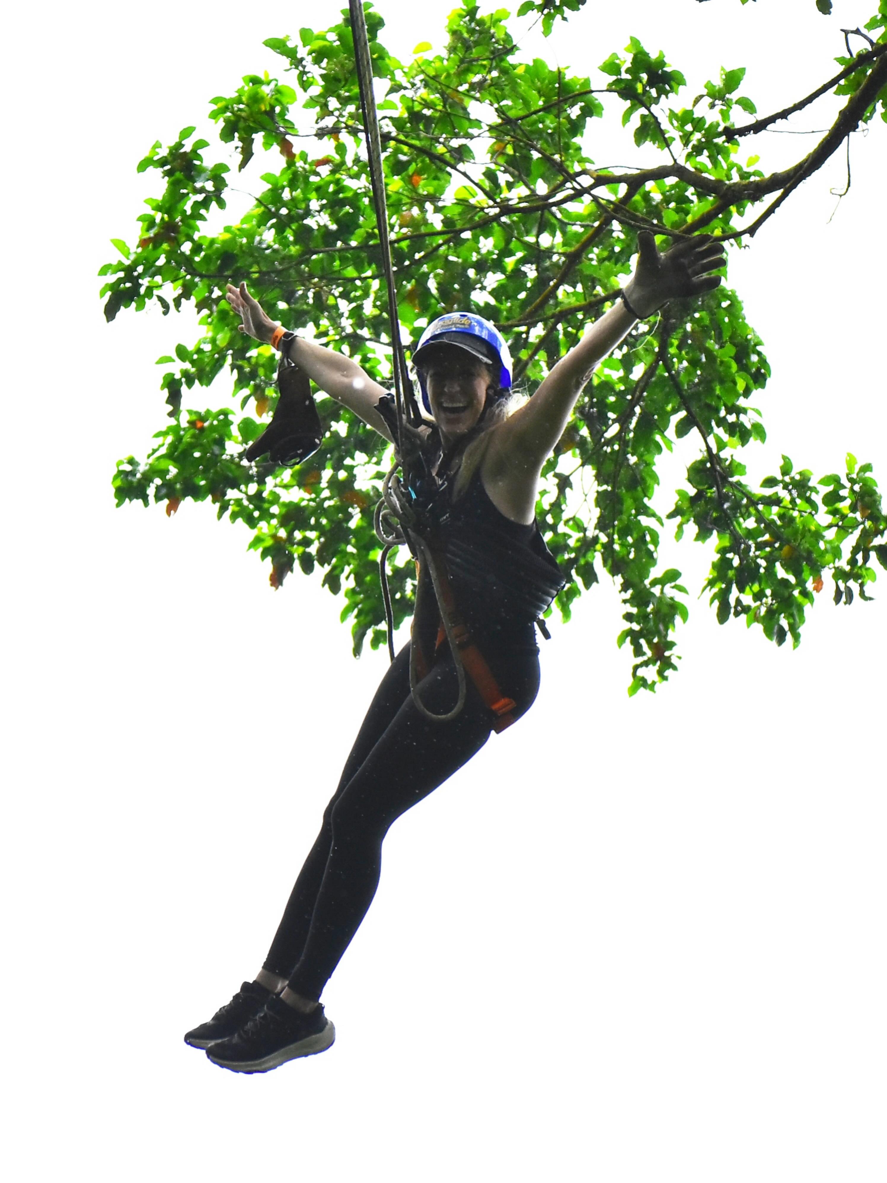Lilian Garcia zip lining with her husband, Patrick Ellrich