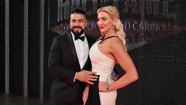 Andrade and Charlotte Flair